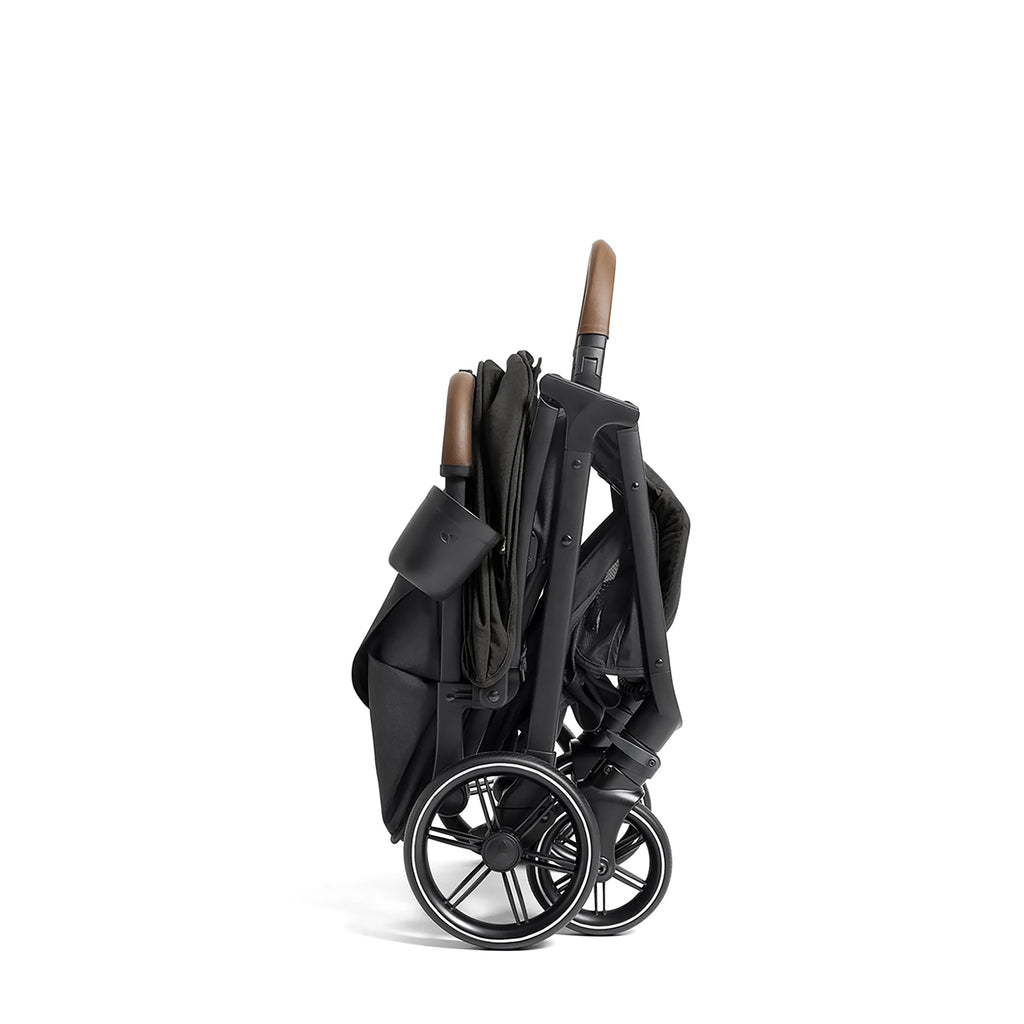 Joie Nutmeg compact stroller in shale color, lightweight design with one-hand fold, suitable for easy travel and daily use.