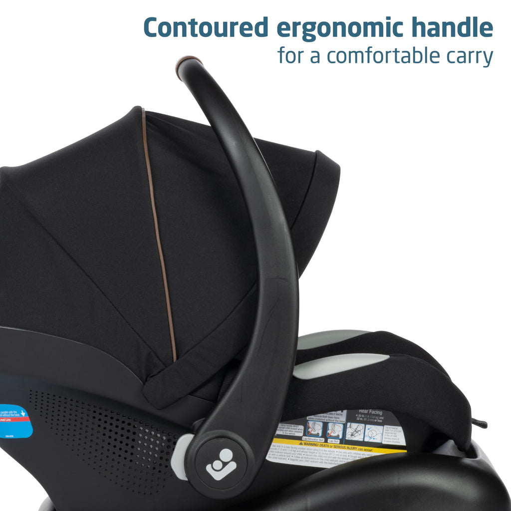 Maxi-Cosi Zelia Luxe 5-in-1 modular travel system with stroller and car seat, featuring adjustable handles and fabric details.