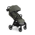 Joie Nutmeg compact stroller in shale color with one-hand fold, lightweight and easy to carry for convenient baby transport.